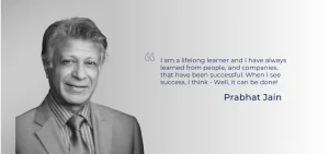 A black and white portrait of Prabhat Jain next to a quote.