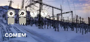Four circular analog gauges are overlaid on a snowy electrical substation.