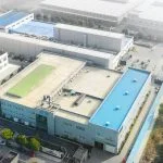 An aerial view of several large industrial buildings and warehouses.