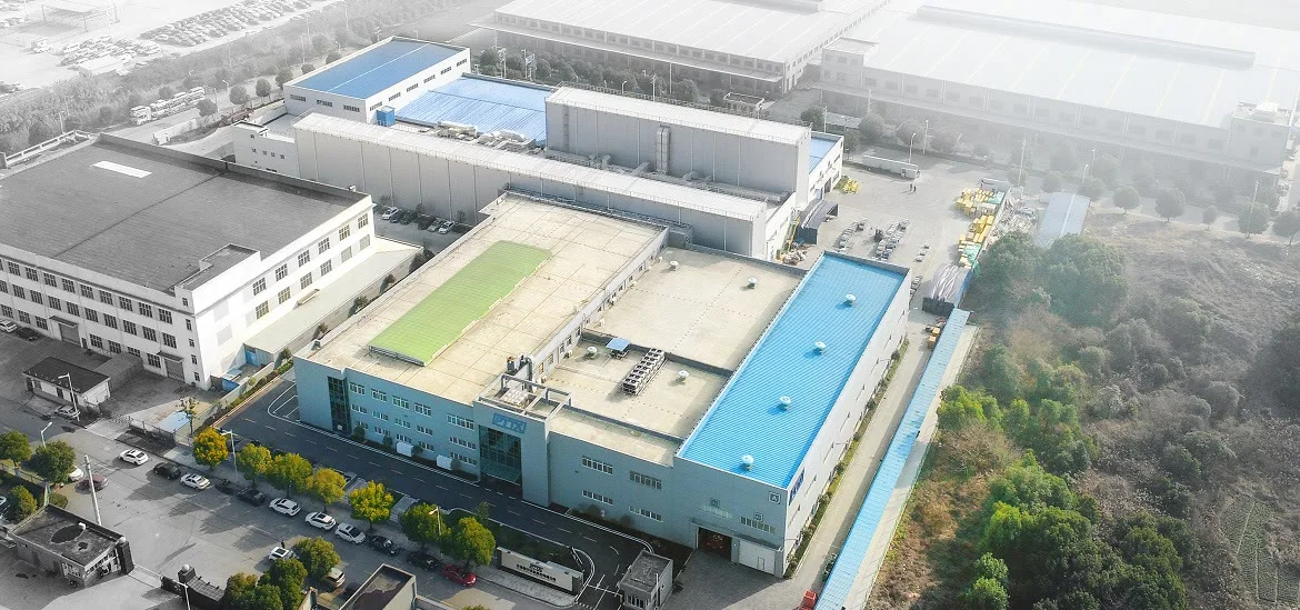 An aerial view of several large industrial buildings and warehouses.