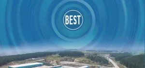 A blue circular graphic with the word "BEST" in white text is centered over a landscape of hills and trees.