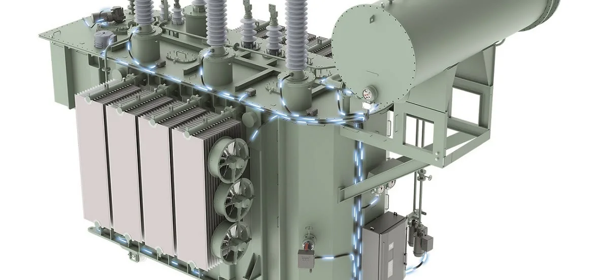 A large industrial electrical transformer with cooling fins and insulators.