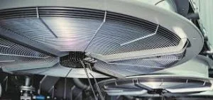 Large industrial ceiling fans with metal blades.