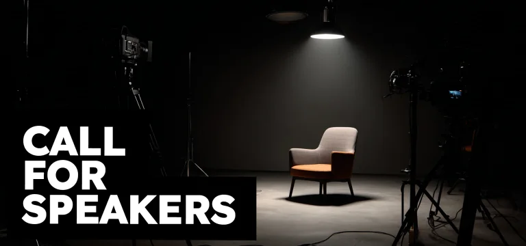 White text reading "CALL FOR SPEAKERS" is overlaid on a dark studio setting with a single chair and lighting equipment.
